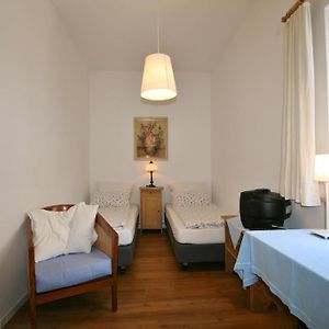Familie Kamer met een King Size Bed
